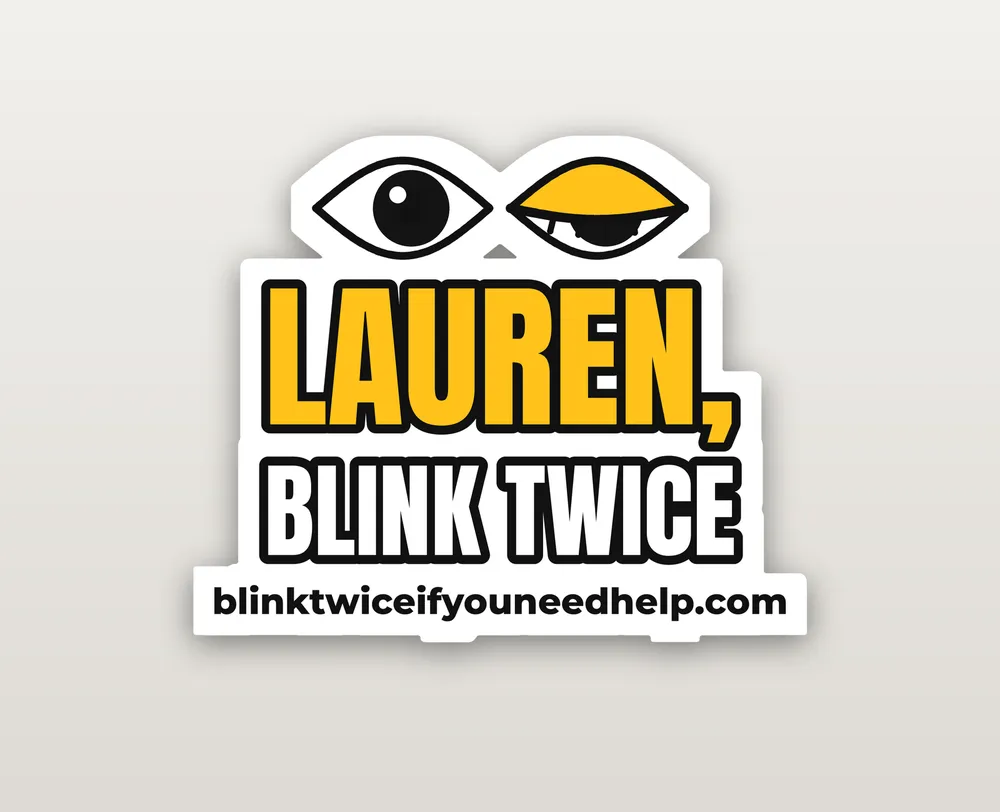 Sticker reading Lauren, blink twice